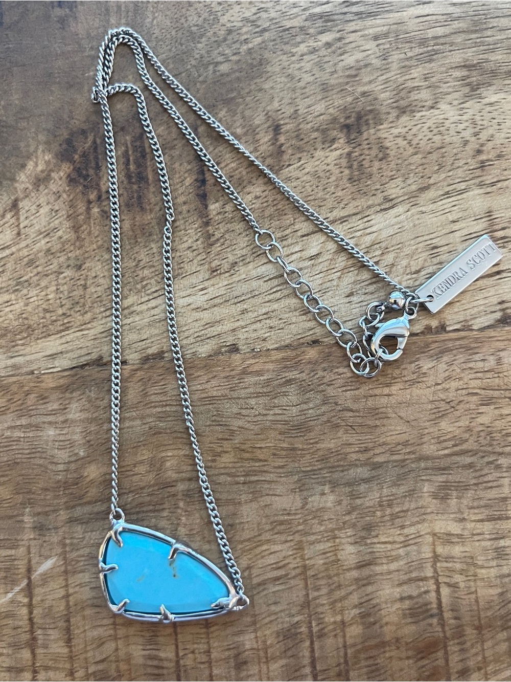 Kendra Scott necklace in turquoise and gold